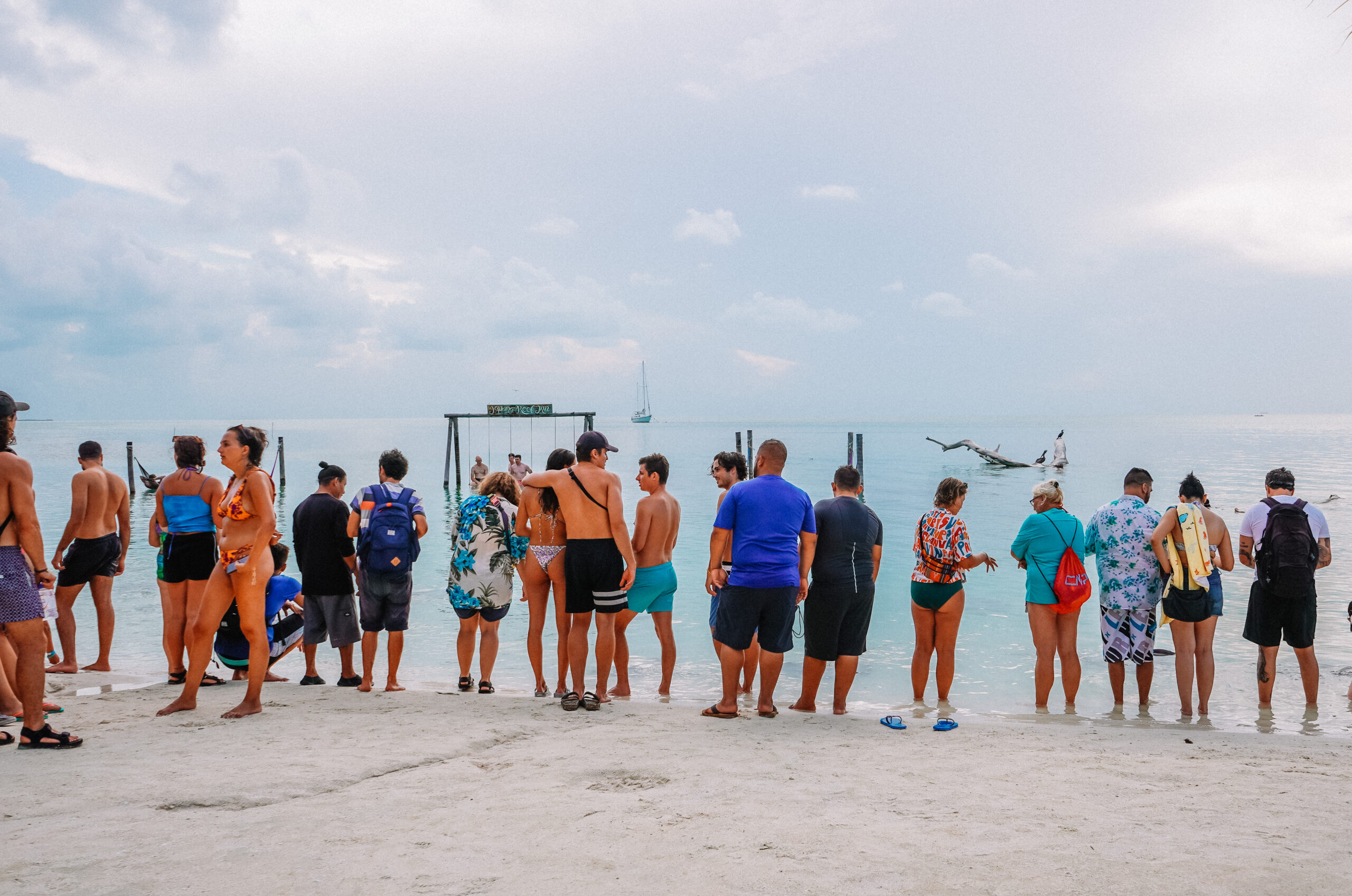 people-watching-stingrays-at-iguana-reef-inn-caye-caulker-belize