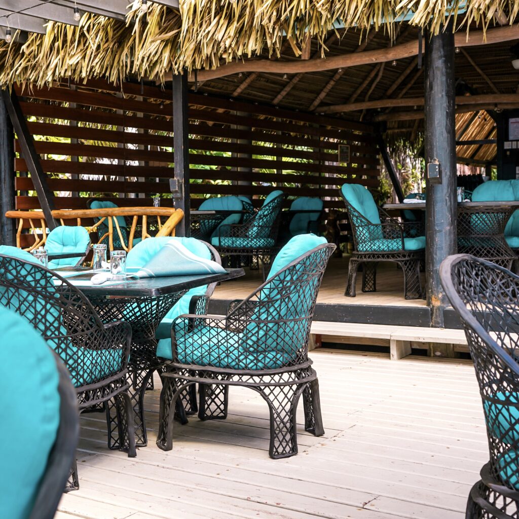 bonefish-grill-outdoor-dining-area-with-turquoise-chairs