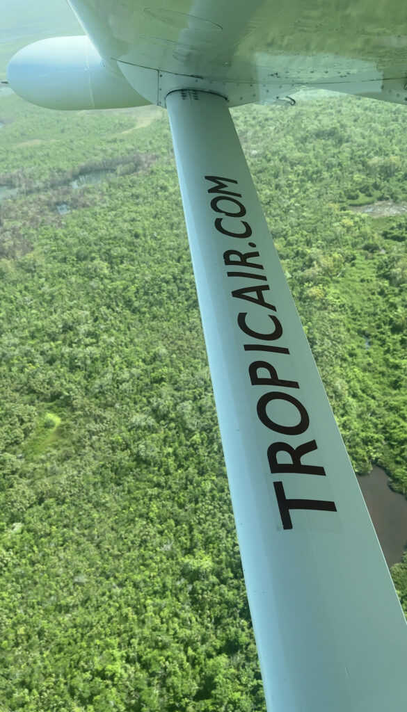 aerial-shot-of-tropic-airplane-over-belize-during-romatic-caribbean-getaway