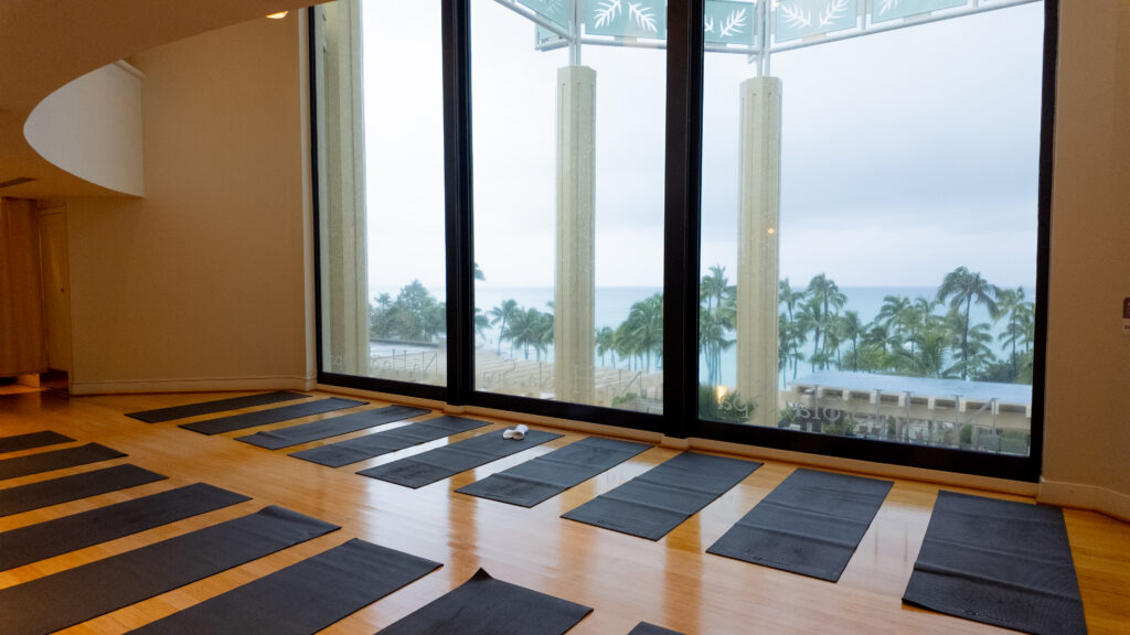 Yoga mats looking out at Waikiki Beach from Na Ho’ola Spa